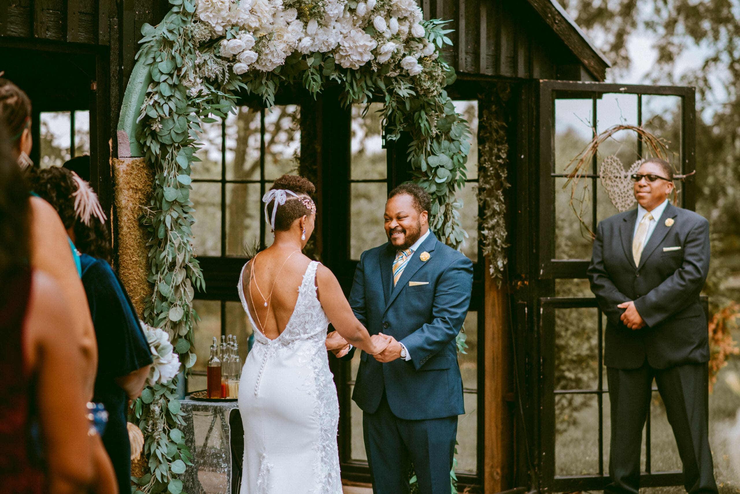 A couple gets married outdoors